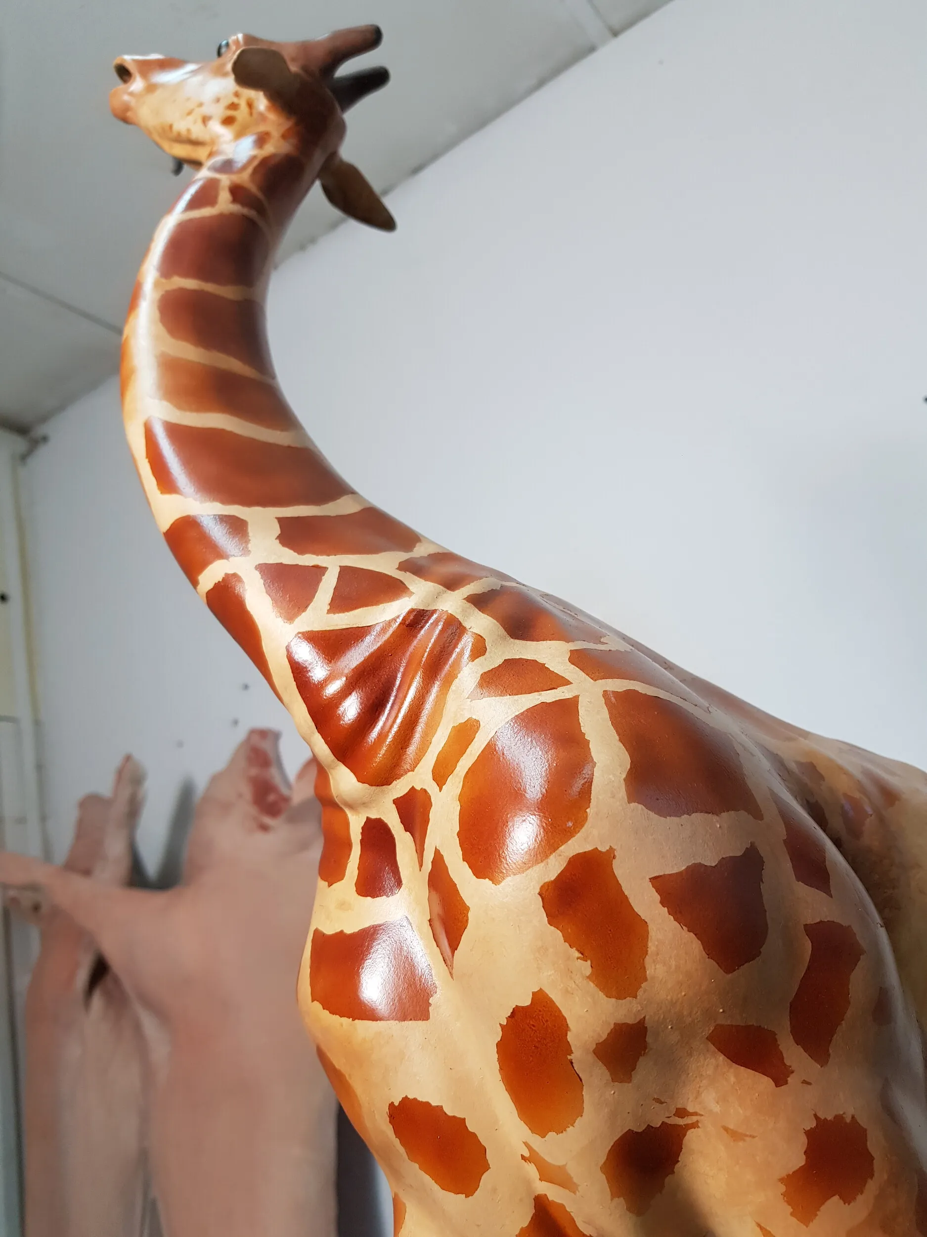 Detail of the giraffe head and neck painting.