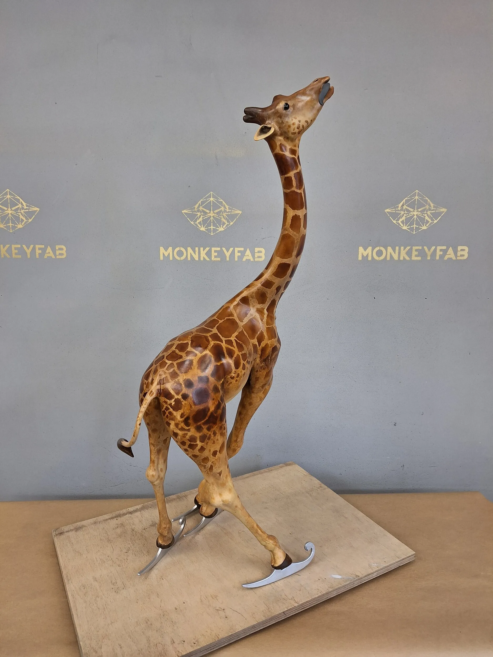 Skating giraffe in a dynamic pose before painting.